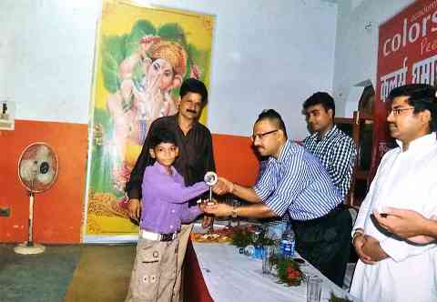 Receiving award from Sir Pankaj Kumar (I.P.S.), Inspector General, Tirhut D