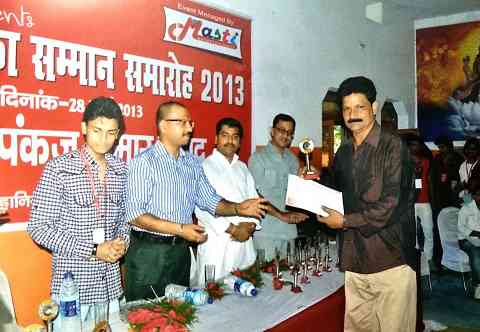 Receiving award from Sir Pankaj Kumar (I.P.S.), Inspector General, Tirhut D